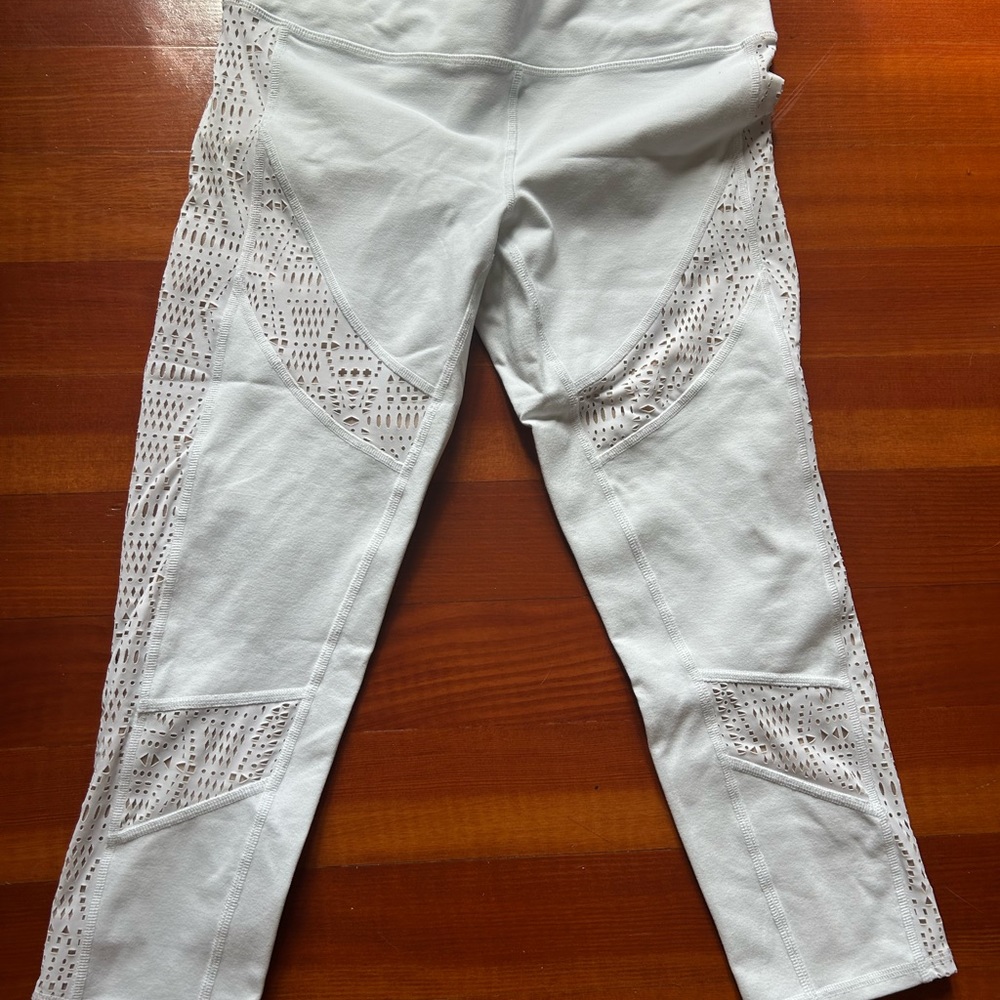 Unique alo legging with cut outs . Size large